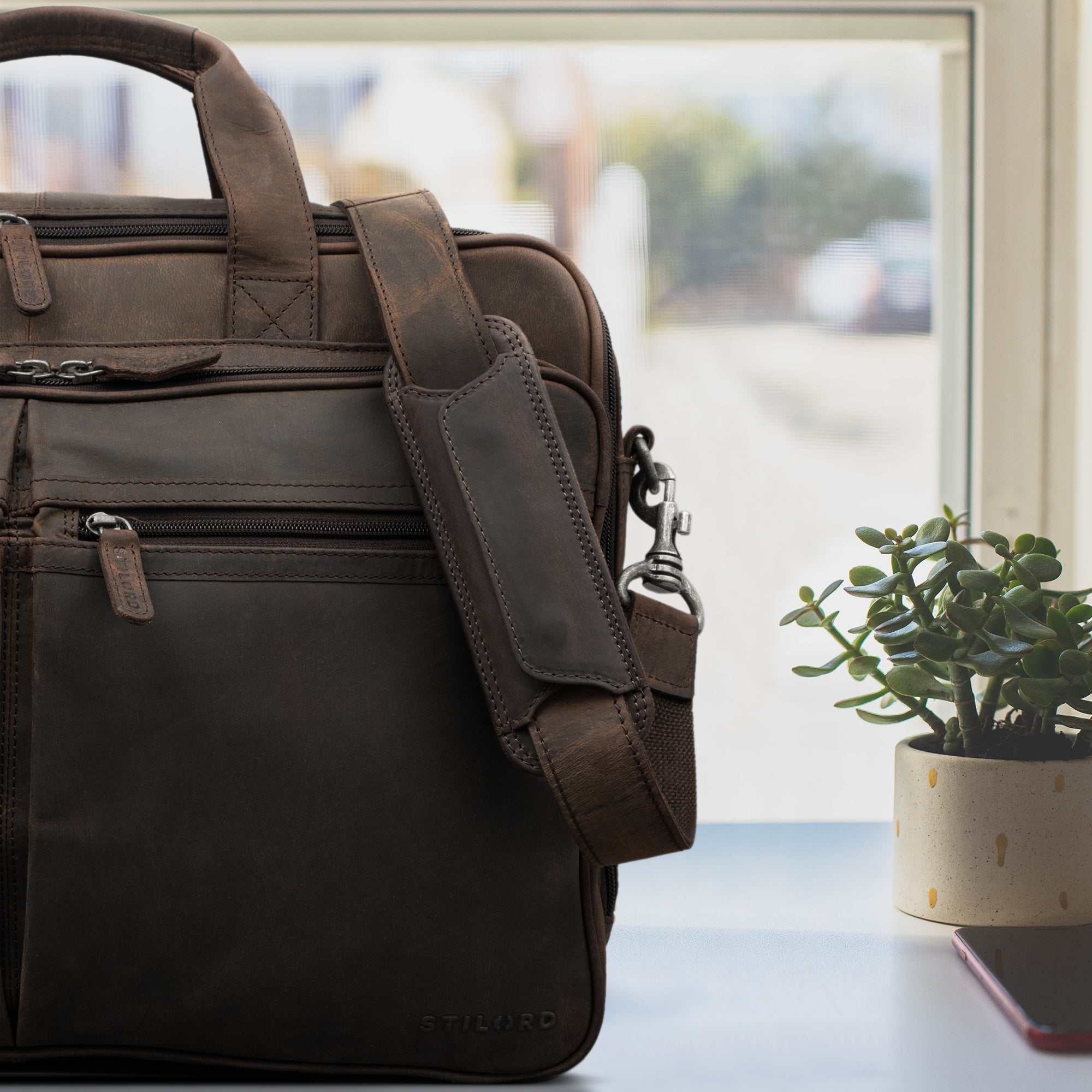 ledertasche dunkel braun schulterpolster